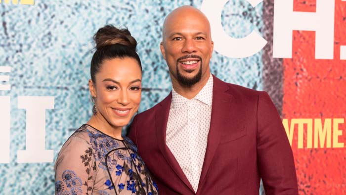 A picture of Angela Rye and Common.